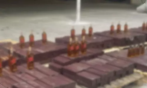 Huge quantity of liquor found hidden in container in Kuwait; Two Indians arrested