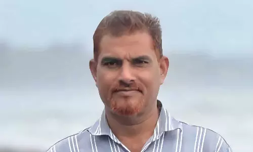 An expatriate who went home for vacation died after falling from a tree.