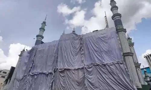 Mosques covered with Cloths ahead of Durga Idol immersion in Hyderabad