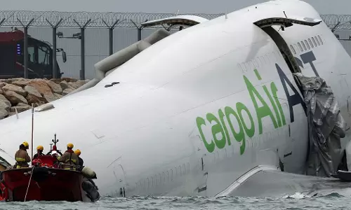 ACT Airlines cargo plane skids off runway, falls into sea, killing two in Hong Kong