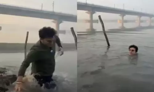 BJP MLA Falls Into Yamuna While Filming Reel On Clean River