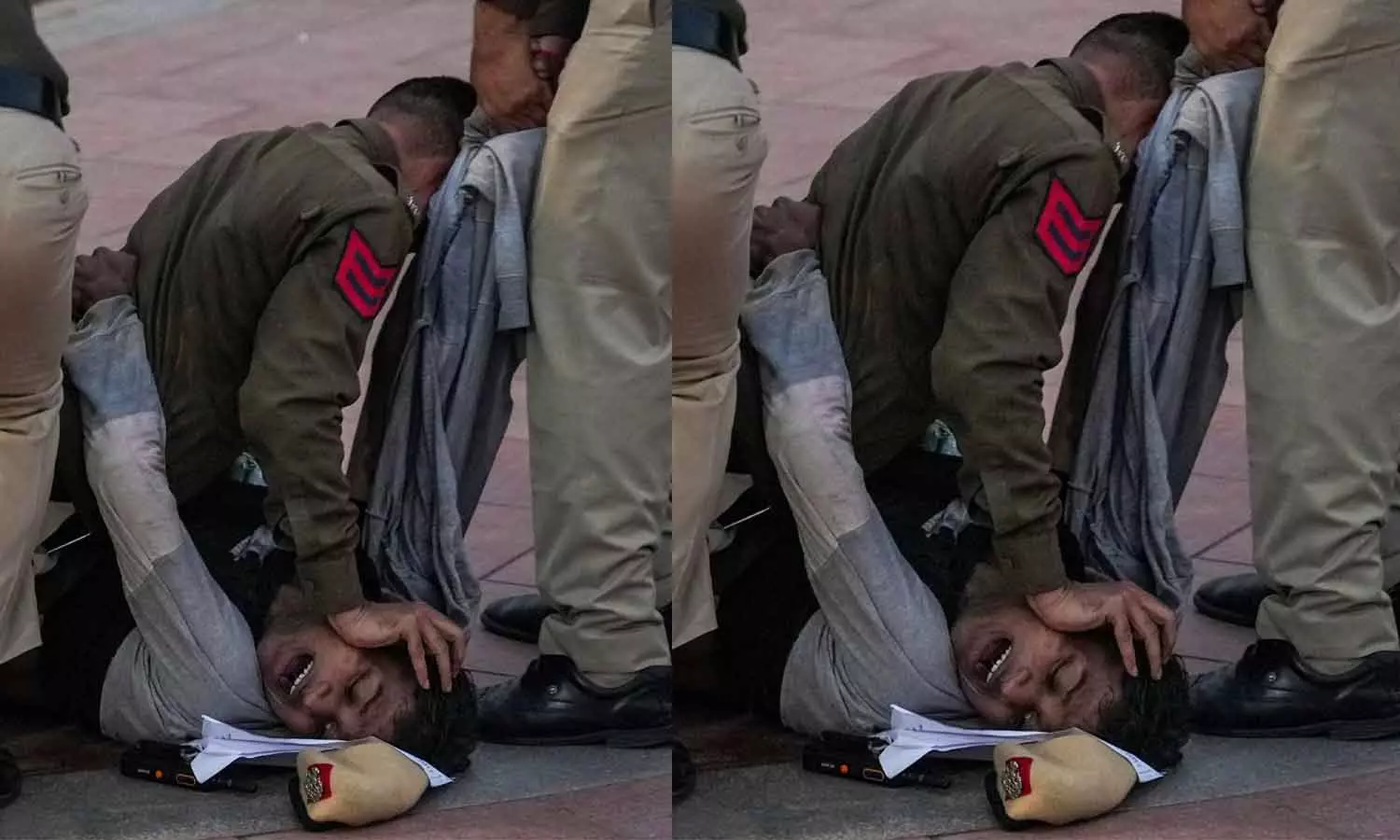 ഡൽഹിയിൽ പ്രതിഷേധിച്ച വിദ്യാർഥിയെ പൊലീസ് ബലം പ്രയോഗിച്ച് അറസ്റ്റ് ചെയ്യുന്നു