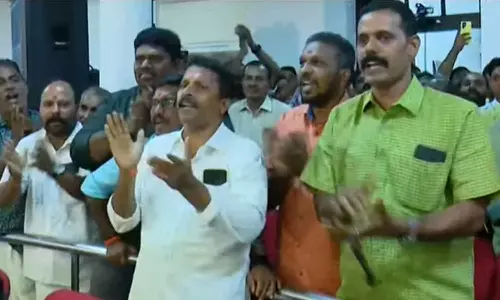 BJP workers sing Ganageetam at Thiruvananthapuram Corporation