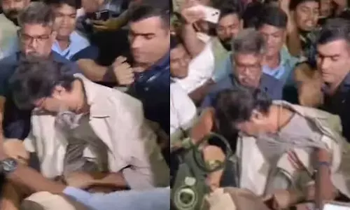 Vijay gets mobbed and falls at Chennai airport as fans rush