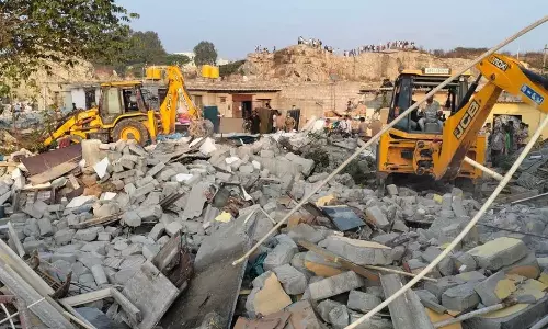 ബുൾഡോസ‍ർ രാജ്; ജനുവരി ഒന്നിന് വീടുകൾ നൽകുമെന്ന് കർണാടക സർക്കാരിൻ്റെ പ്രഖ്യാപനം