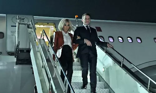 Macron arrives in Mumbai on India visit