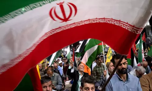 Iranians wave flags on Ahvaz bridge