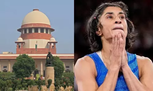 വിനേഷ് ഫോഗട്ട് ഏഷ്യൻ ഗെയിംസ് യോഗതാ റൗണ്ടിൽ മത്സരിക്കുന്നത് തടയാൻ സുപ്രീം കോടതിയെ സമീപിച്ച് റെസ്ലിങ് ഫെഡറേഷൻ വിനേഷ് ഫോഗട്ട് ഏഷ്യൻ ഗെയിംസ് യോഗതാ റൗണ്ടിൽ മത്സരിക്കുന്നത് തടയാൻ സുപ്രീം കോടതിയെ സമീപിച്ച് റെസ്ലിങ് ഫെഡറേഷൻ
