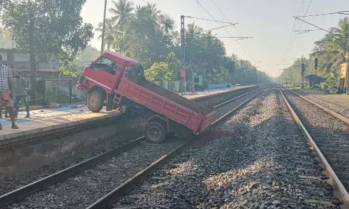 A truck fell onto the railway track in Mukkali, Kozhikode. A truck fell onto the railway track in Mukkali, Kozhikode.