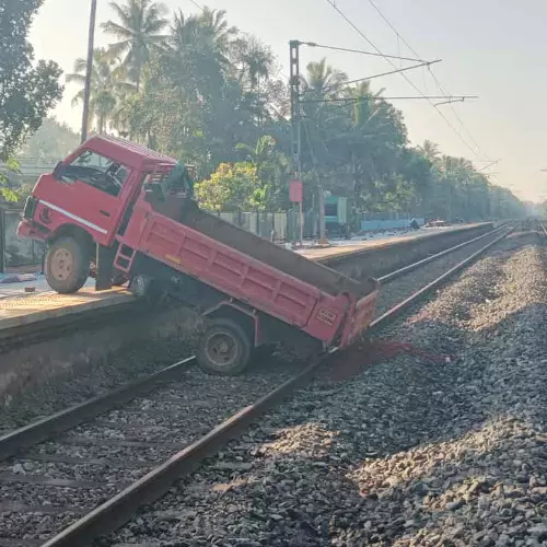 A truck fell onto the railway track in Mukkali, Kozhikode.
