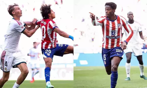 Red card for Huesan; Atletico defeat Real 2-1 in the Madrid derby. Red card for Huesan; Atletico defeat Real 2-1 in the Madrid derby.