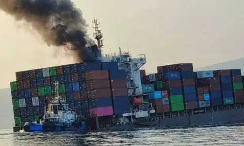 Oman warns of hazardous floating containers after ship sinks off Musandam Oman warns of hazardous floating containers after ship sinks off Musandam