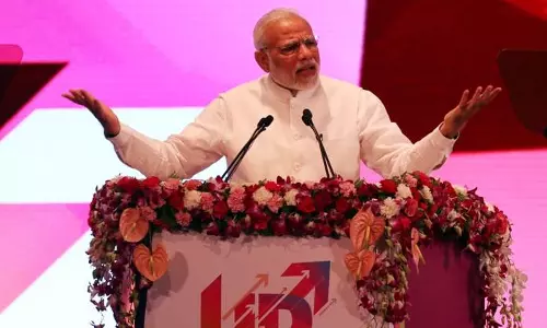 വ്യവസായികള്‍ക്കൊപ്പം നില്‍ക്കാന്‍ ഭയമില്ലെന്ന് മോദി