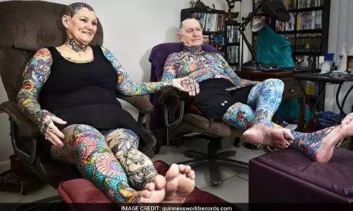ടാറ്റൂ അടിച്ച് ഗിന്നസില്‍ കയറിയ ദമ്പതികള്‍