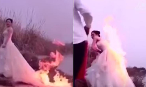 ഫോട്ടോ ഗംഭീരമാകാന് വധുവിന്റെ ഗൌണിന് തീയിട്ടു ഫോട്ടോ ഗംഭീരമാകാന് വധുവിന്റെ ഗൌണിന് തീയിട്ടു