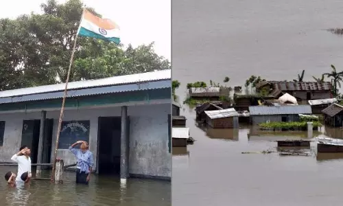 വെള്ളക്കെട്ടിന് നടുവില്‍ നിന്നും ദേശീയ പതാകയ്ക്കൊരു ബിഗ് സല്യൂട്ട്; കാണൂ ഈ കുട്ടികളുടെ ദേശസ്നേഹം
