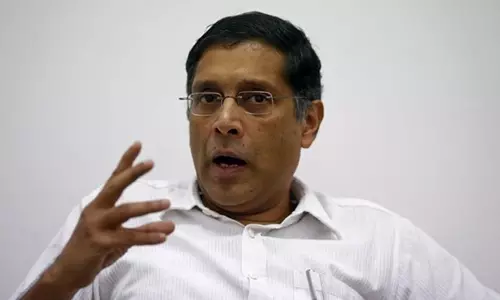 ബീഫ് നിരോധത്തെ കുറിച്ച് സംസാരിച്ച് ജോലി നഷ്ടപ്പെടുത്താനില്ല: സാമ്പത്തിക ഉപദേഷ്ടാവ്