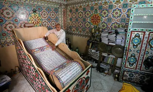 ഖുര്‍ആന്റെ ഏറ്റവും വലിയ കൈയെഴുത്ത് പ്രതി തയ്യാറാക്കി സഅദ് മുഹമ്മദ്; നീളം 700 മീറ്റര്‍