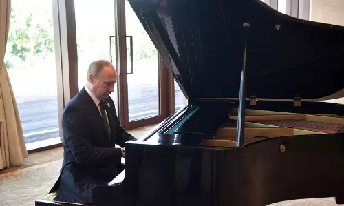 ചൈനീസ് പ്രസിഡന്റിന്റെ വീട്ടില്‍ പുടിന്റെ പിയാനോ വായന