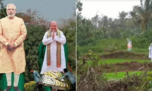 മോദിയെയും അമിത് ഷായെയും പാടങ്ങളിലെ കോലങ്ങളാക്കി കര്‍ണാടകയിലെ കര്‍ഷകര്‍