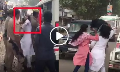 അമിത് ഷായെ കരിങ്കൊടി കാണിച്ച വിദ്യാര്‍ഥിനികളെ തല്ലിയൊതുക്കി പൊലീസ്