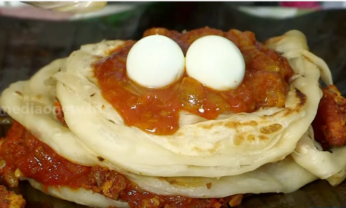 കിഴിക്കുള്ളില്‍ രുചിയുടെ പൂരം; ഒരു രക്ഷേമില്ല, ഇതൊരു ഒന്നൊന്നര പൊറോട്ടയാണ് മക്കളേ...