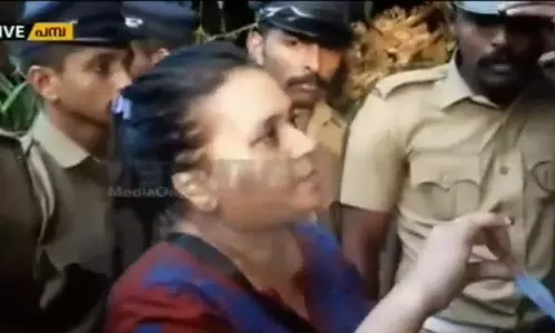 കല്ലേറും അസഭ്യവര്‍ഷവും; സന്നിധാനത്തേക്ക് തിരിച്ച  വനിതാ റിപ്പോര്‍ട്ടര്‍ തിരിച്ചിറങ്ങി