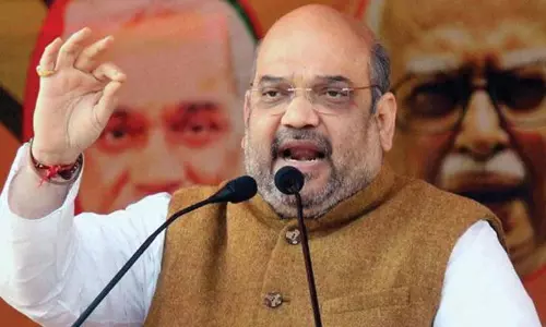 ഔദ്യോഗിക ഉദ്ഘാടനത്തിന് മുമ്പ് കണ്ണൂര്‍ വിമാനത്താവളത്തിലെ ആദ്യ യാത്രക്കാരനായി അമിത്ഷാ