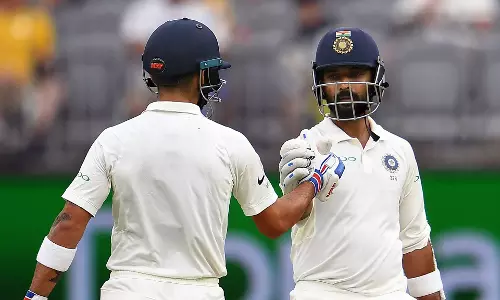 കോഹ്‌ലിക്കും രഹാനെക്കും അര്‍ദ്ധ സെഞ്ച്വറി; ഇന്ത്യ പൊരുതുന്നു