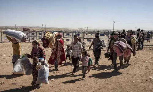 സിറിയയിലെ മൻബിജില്‍ നിന്നും കുര്‍ദുകളുടെ കൂട്ടപലായനം