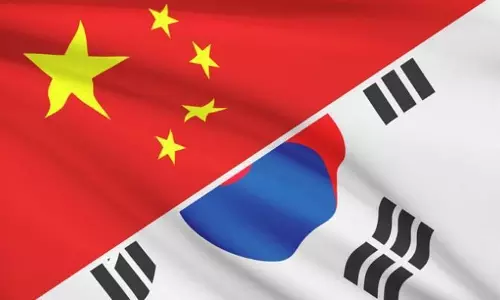 ജപ്പാനും ദക്ഷിണ കൊറിയയുമായി വികസനകാര്യത്തില്‍ ഒന്നിച്ചു പ്രവര്‍ത്തിക്കാന്‍ ചൈന